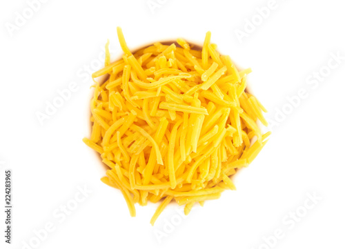 Bowl of Grated Cheddar Cheese on a White Background