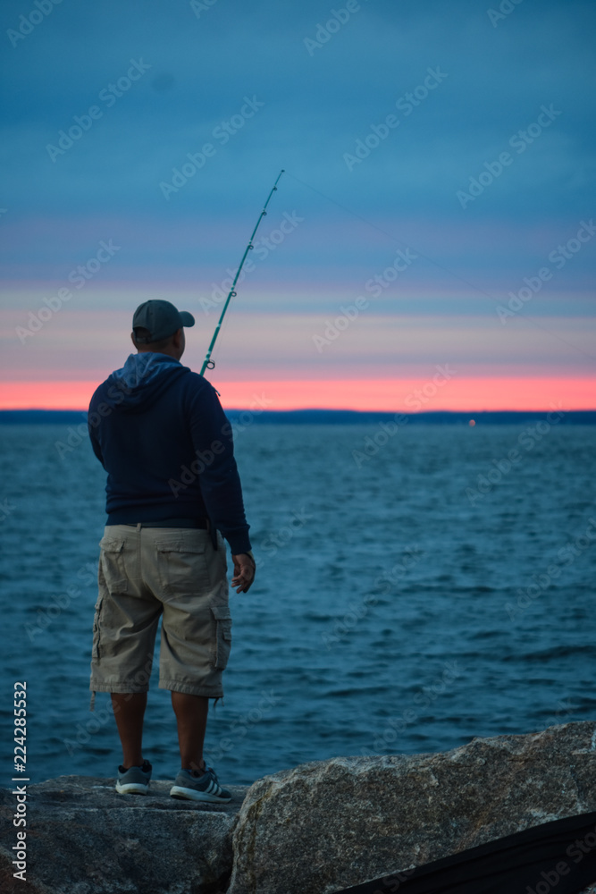 Fisherman fishing fishes