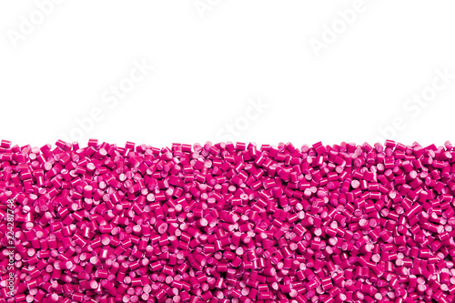 pink plastic resin ( Masterbatch ) isolated on white background photo