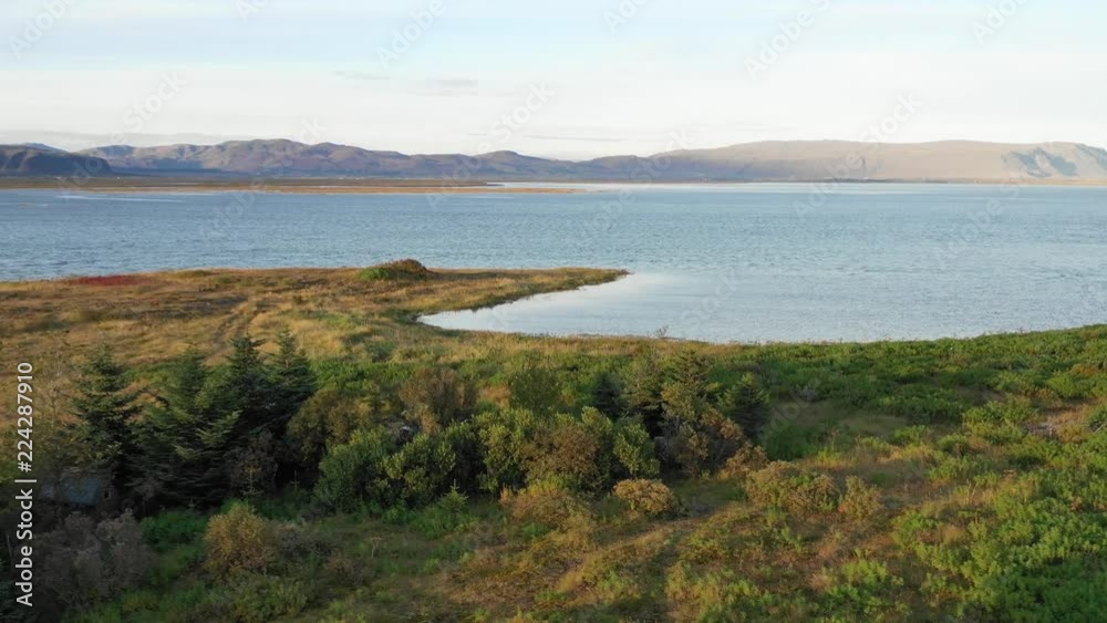 Aerial Video of Modern Scandinavian House with Lake and Mountain in Distance Aerial Video of Modern Scandinavian House with Lake and Mountain in Distance