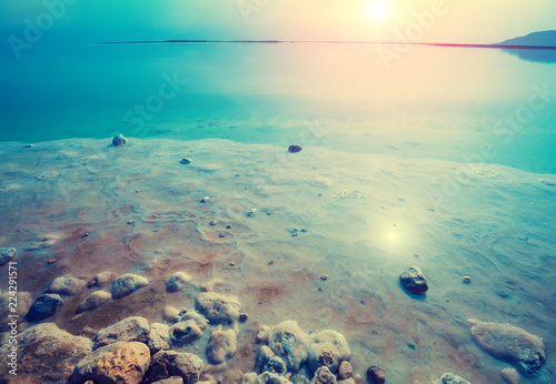 Foto Early in the morning on the beach