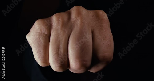 Fist Appearing in an aggressive manor close to camera