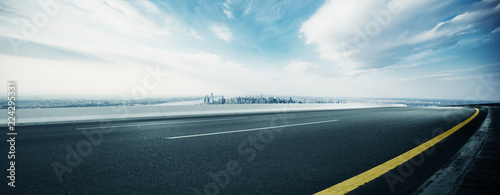 empty highway through modern city photo