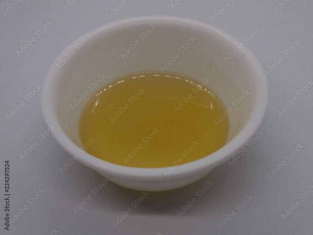garlic oil,Extreme close-up image of garlic oil studio isolated on Wooden background, making Garlic Oil for Pain, Oil For Arthrites Joint Pain garlic oil,Extreme close-up image of garlic oil studio isolated on Wooden background, making Garlic Oil for Pain, Oil For Arthrites Joint Pain