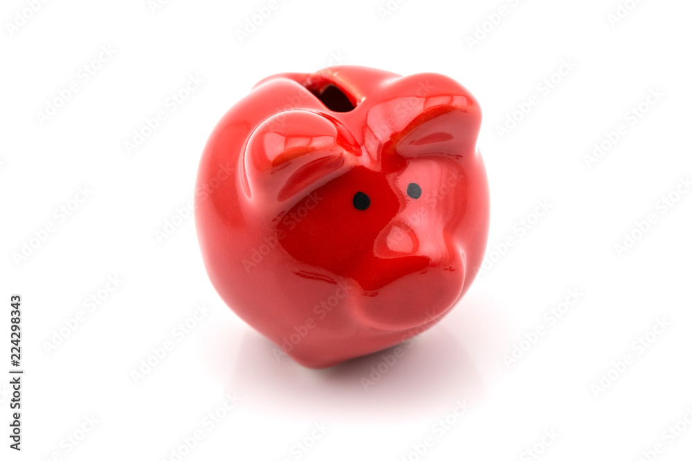 Close up of red piggy bank isolated on white Close up of red piggy bank isolated on white