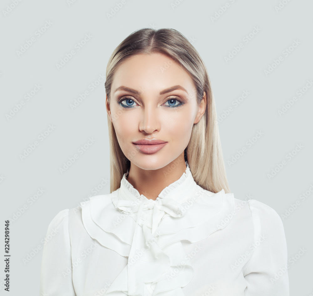 Business woman portrait. Smart businesswoman in white shirt