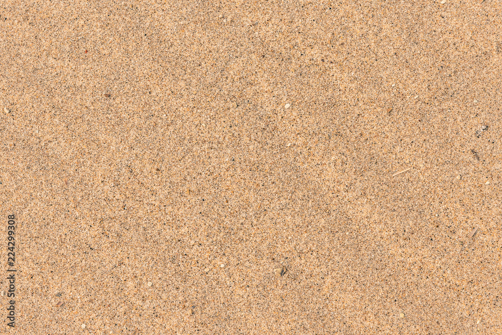 Sand background with undulating structure close-up Sand background with undulating structure close-up