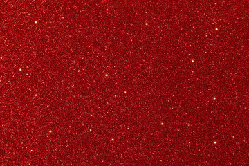 Red glitter lights background. defocused.