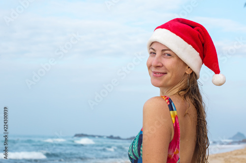 Santa girl on the beach