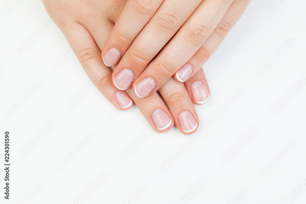 Beautiful female hands. Manicured hands on white background Beautiful female hands. Manicured hands on white background