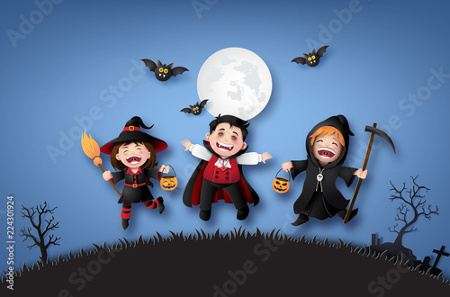 children in halloween costumes.