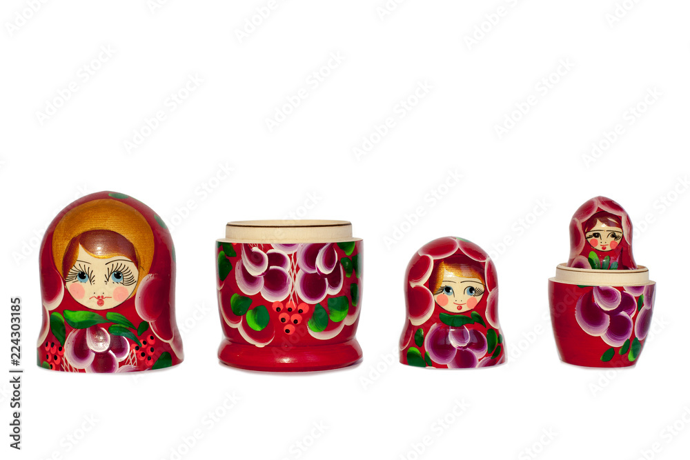 Matryoshka Russian souvenir bright red on white background isolated closeup