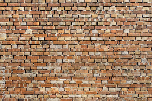 Texture of masonry at a old red brick wall