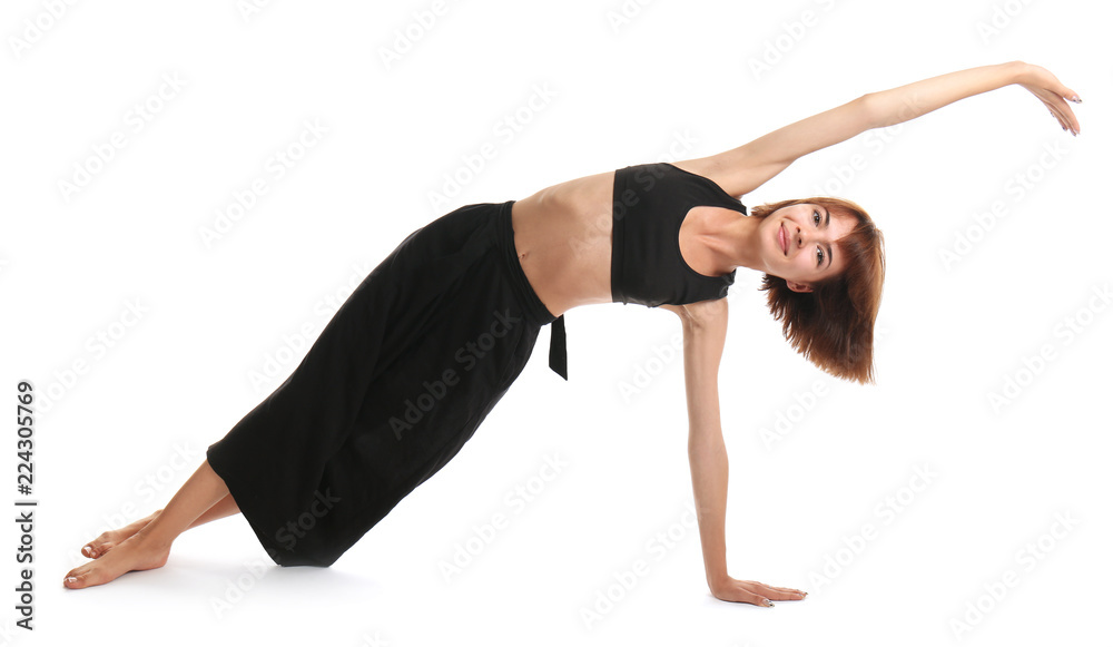 Sporty woman practicing yoga on white background Sporty woman practicing yoga on white background