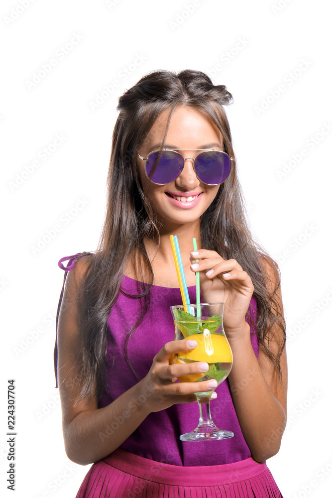 Young woman with glass of fresh lemonade on white background Young woman with glass of fresh lemonade on white background