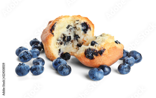 Fototapeta Tasty blueberry muffin on white background