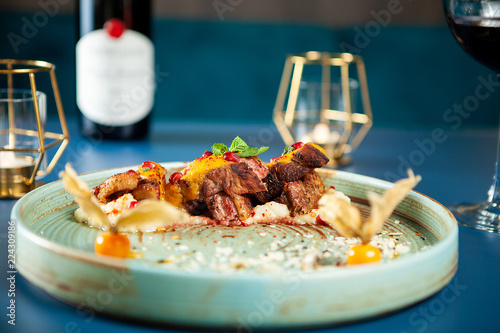 Fotografie, Tablou Tasty restaurant gastronomy with red wine on the table