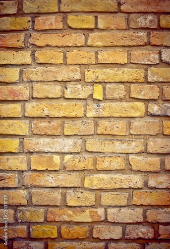 background of dark orange brick laid horizontally 