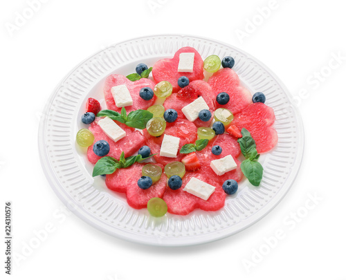 Plate with delicious watermelon salad on white background