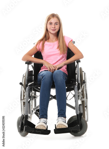 Teenage girl in wheelchair ...