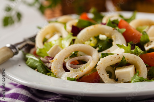 Salad with squid rings.