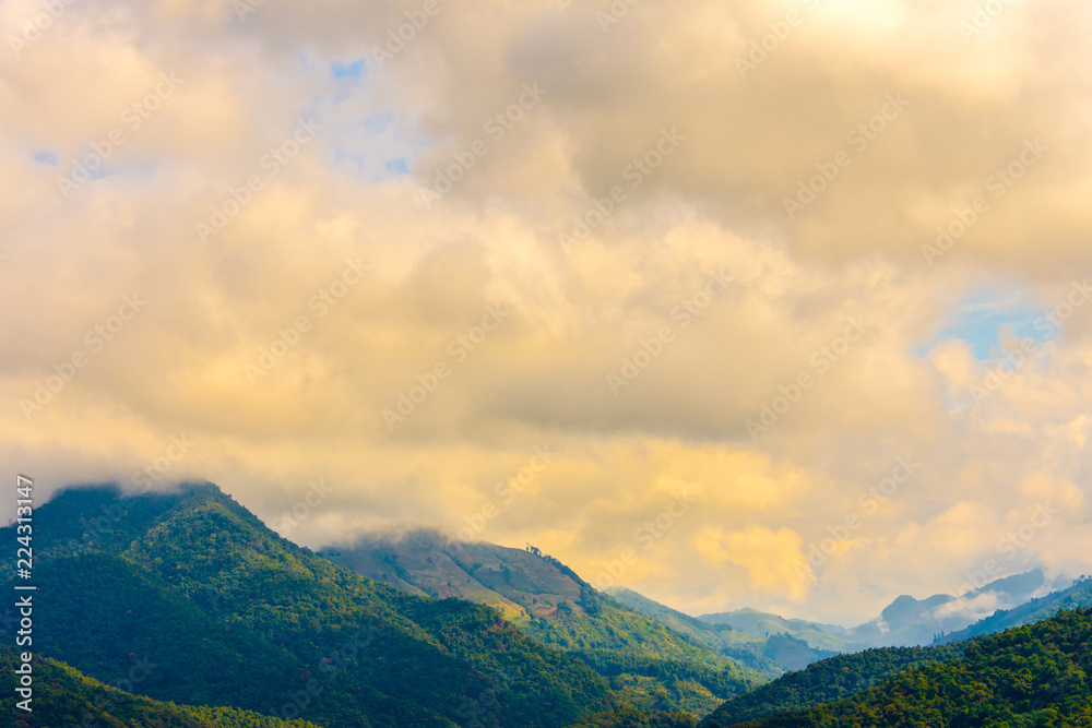 Beautiful  landscape view of hill and  mountain with cloud sky.