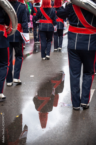 Details from a show and Marchingband or fanfare and drumband with uniforms and Instruments. photo