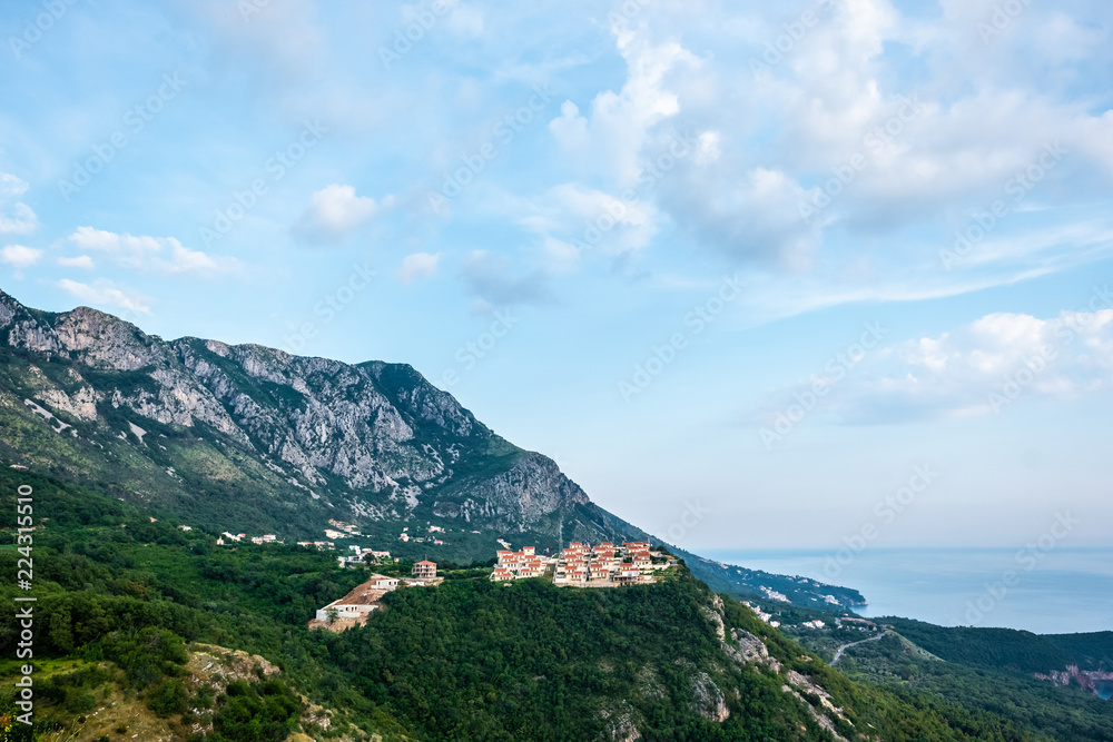 houses on green hill near Budva town in Montenegro