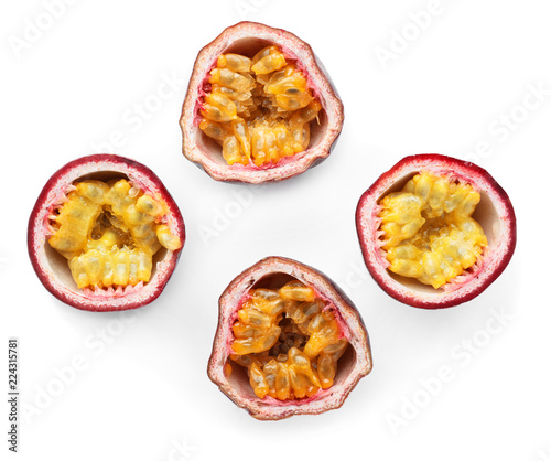 Cut tropical fruits on white background