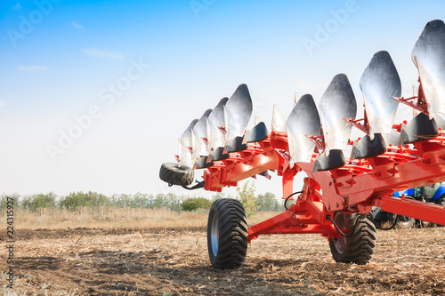 Agricultural plow close-up on the ground photo