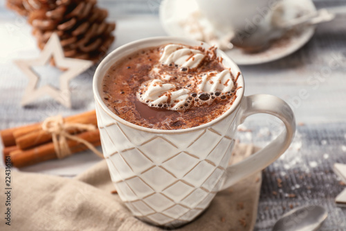 Fototapeta Naklejka Na Ścianę i Meble -  Cup of hot chocolate with marshmallows on table