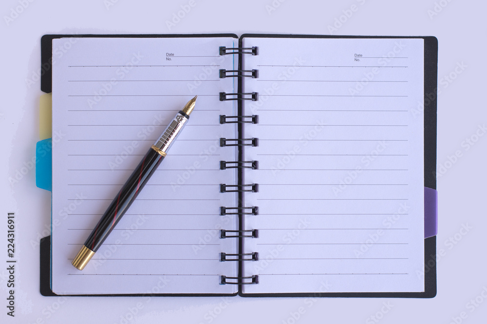 White blank opened spiral notebook isolated on white background. White blank opened spiral notebook isolated on white background.