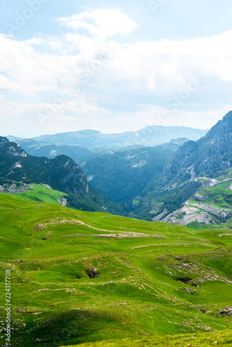 landscape of green valley and mountains in Durmitor massif  Montenegro