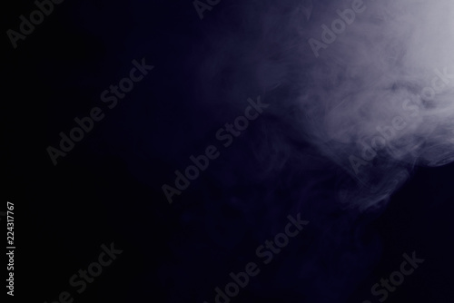 grey smoke on a dark background