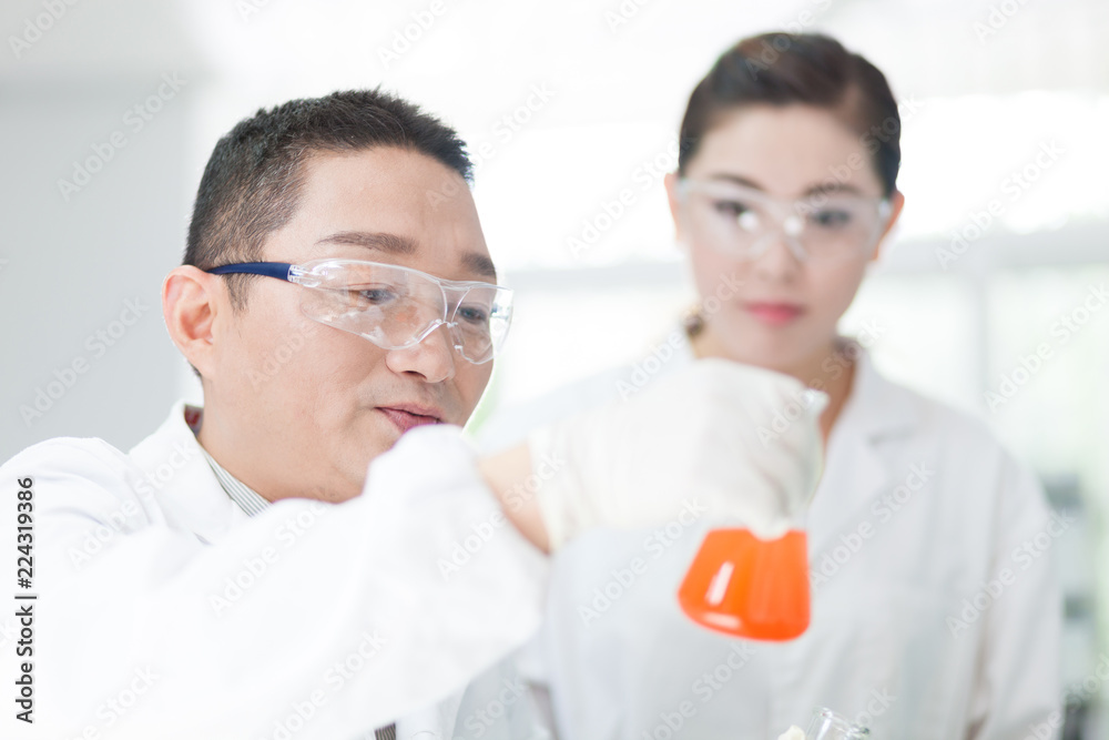 people working at laboratory people working at laboratory
