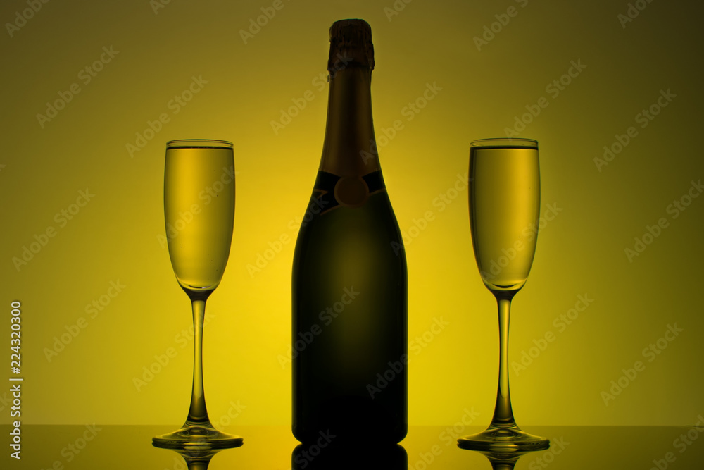 a bottle of champagne with two glasses a bottle of champagne with two glasses