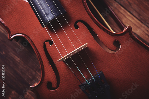 violin on an old wooden background