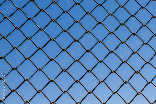 Metal fence from the grid. Protective fence. Texture