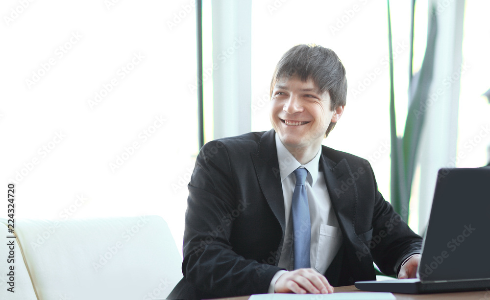 young businessman on workplace in the office young businessman on workplace in the office