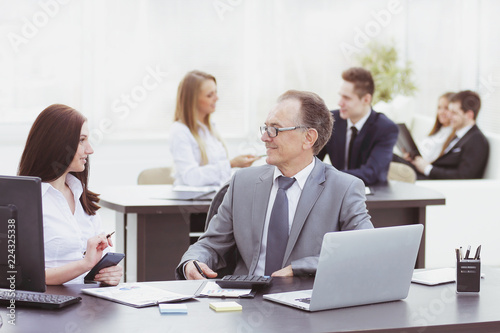 Businessman analyzing investment, budget and income charts at his workplace