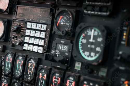 Helicopter cockpit. Details of dashboard, control panel, indicators and fire buttons. War machine, air bomber. 