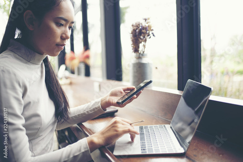 business women using smartp...