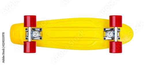 Yellow cruiser penny plastboard with red wheels photo