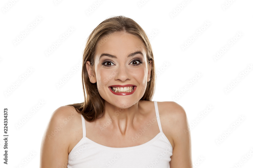 Portrait of young beautiful happy girl on white backgeound Portrait of young beautiful happy girl on white backgeound