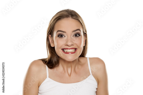 Portrait of young beautiful happy girl on white backgeound