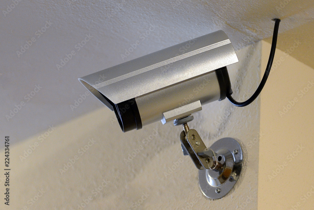 surveillance camera on the ceiling in the room surveillance camera on the ceiling in the room
