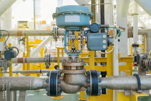 Actuated control valve fail to open type and valve positioner control by programmable logic controller (PLC) to control oil and gas conditioning process Fototapeta