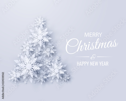 Vector Merry Christmas and Happy New Year greeting card design with Christmas tree made of realistic looking paper cut snowflakes. Seasonal Christmas and New Year holidays paper craft background