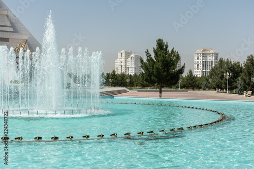 building with fountain in Ashgabat, the capital of Turkmenistan and the city having the most fountains of the entire world