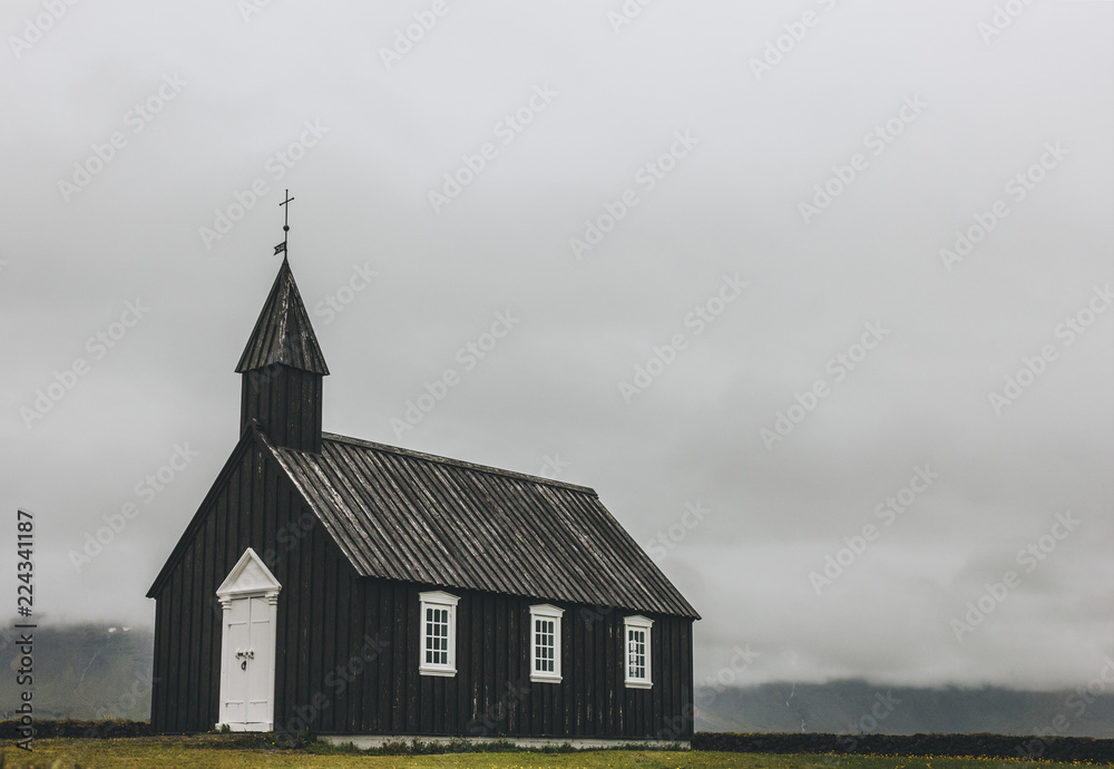 scenic shot of Budir church on green field at Snaefellsnes, Iceland